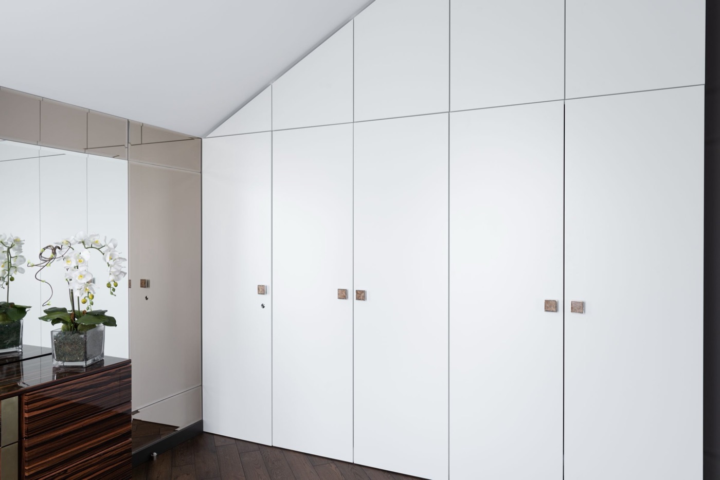 White full-height wardrobe wall