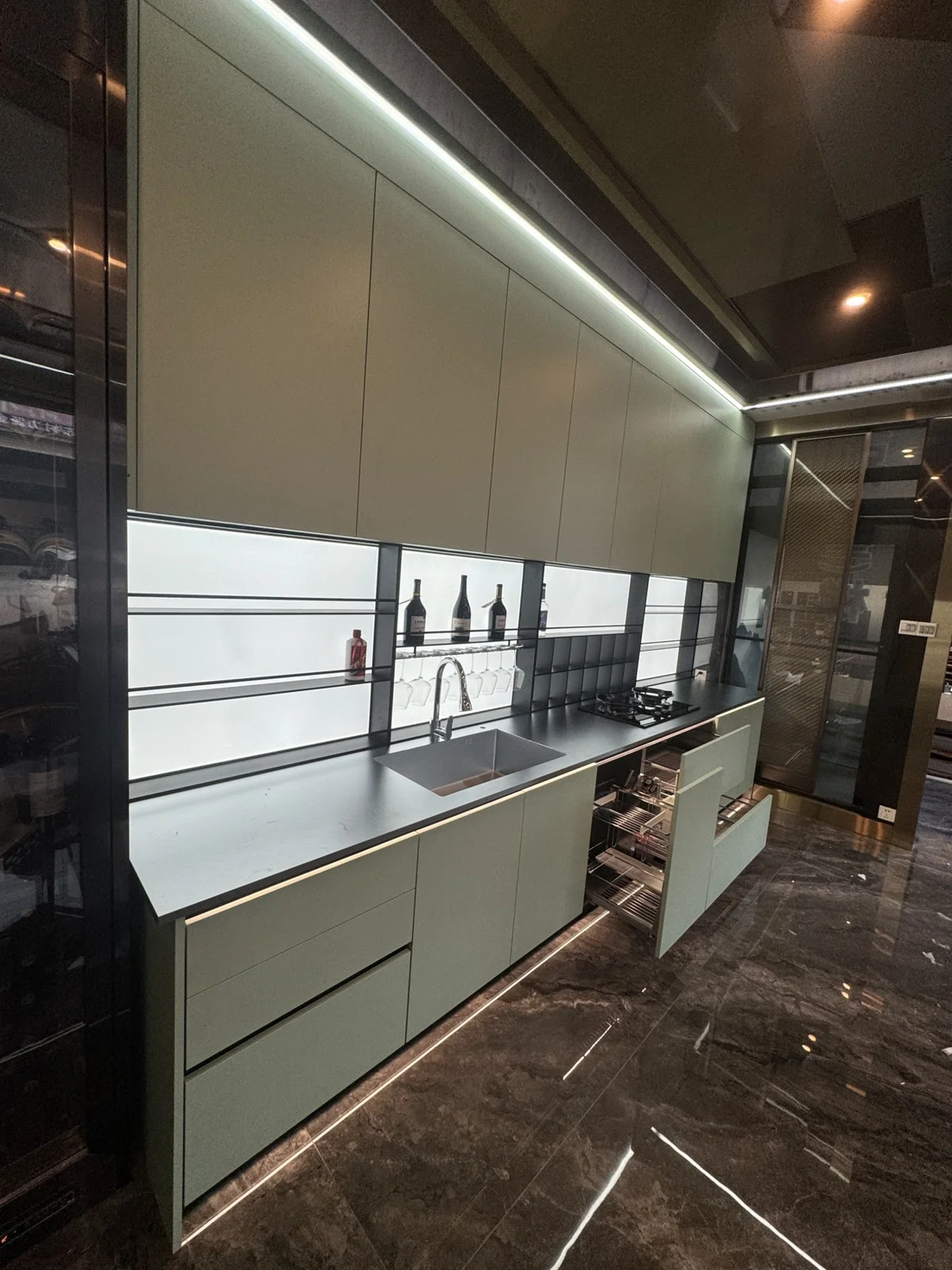 Stainless cabinetry, with a domestic character