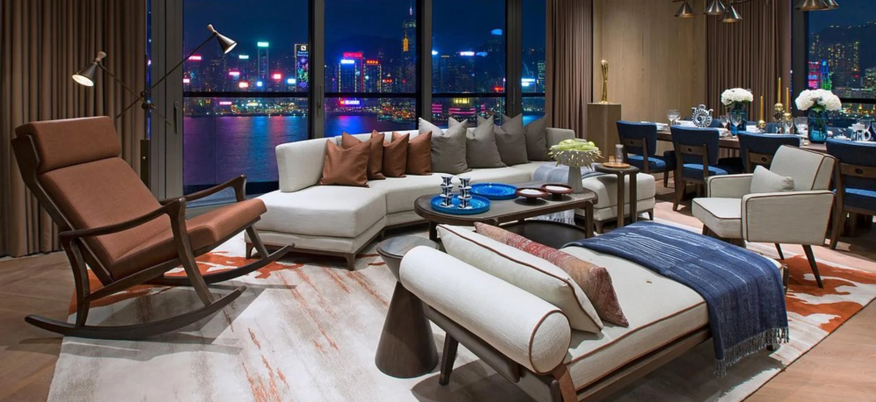 Loose furniture in a harbour-facing residential interior.