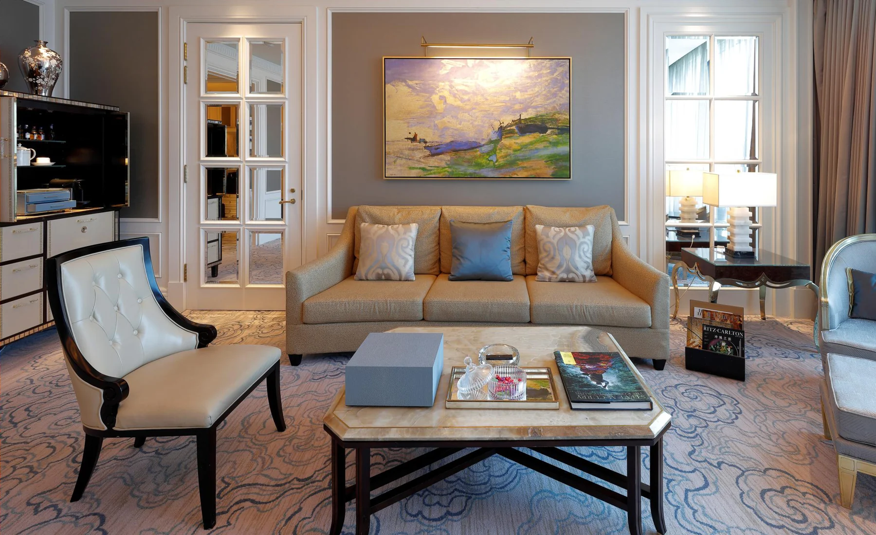 Upholstered seating and occasional tables in the Macau project.