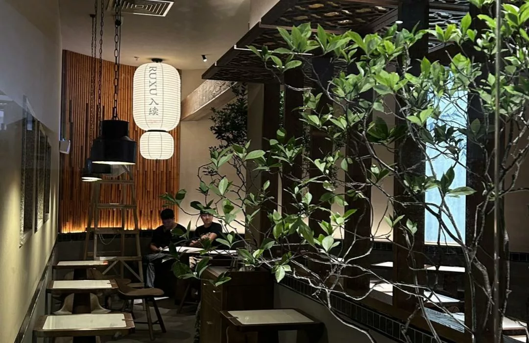 Custom rice-paper lantern in the RUXU Sugar House interior
