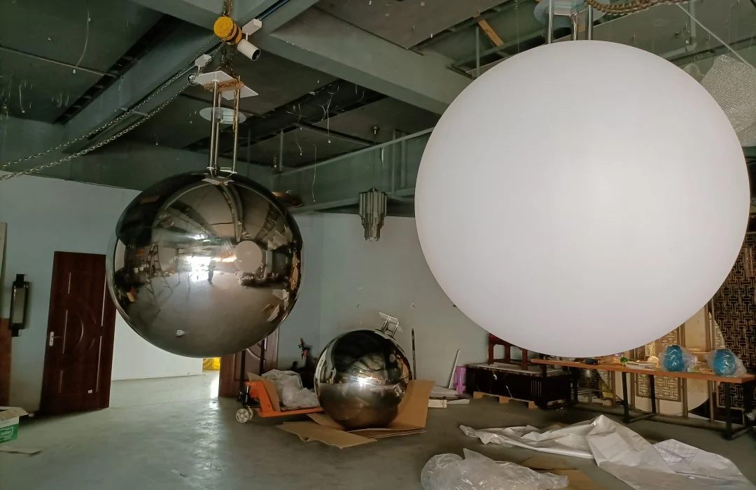 Large spherical lighting elements being prepared in the workshop for Vanke UniCity