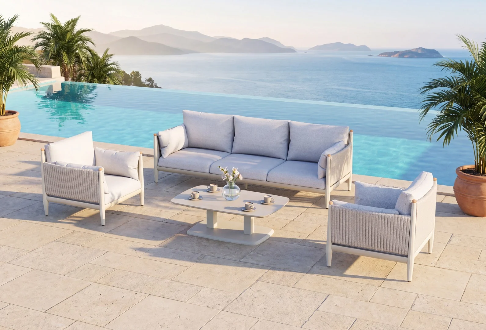 Complete BLISS outdoor sofa and armchairs beside the pool in a supplier scene