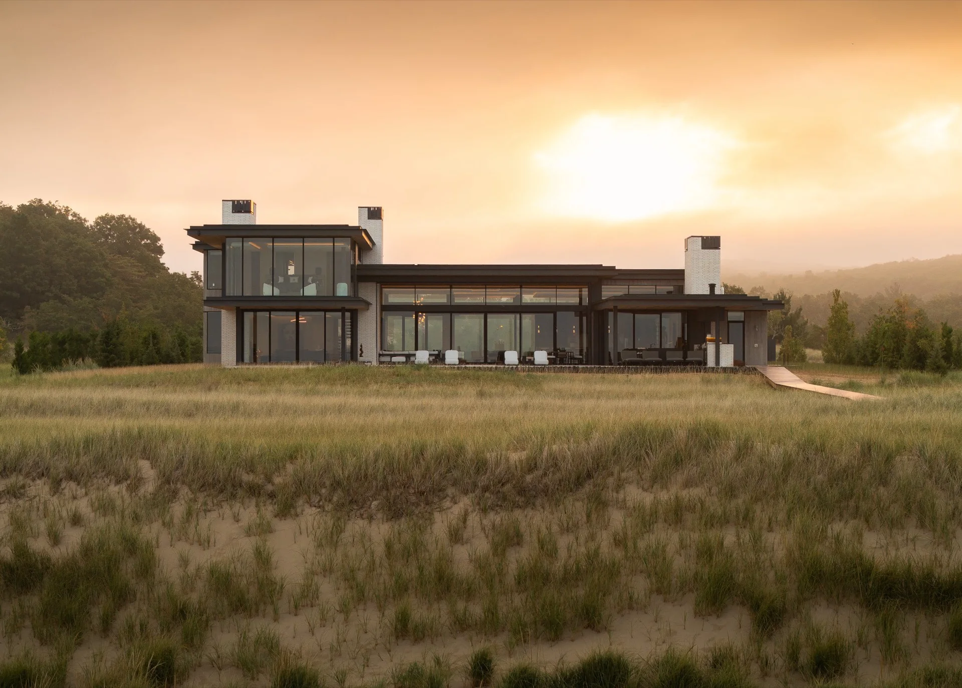Contemporary home at sunset in a natural landscape