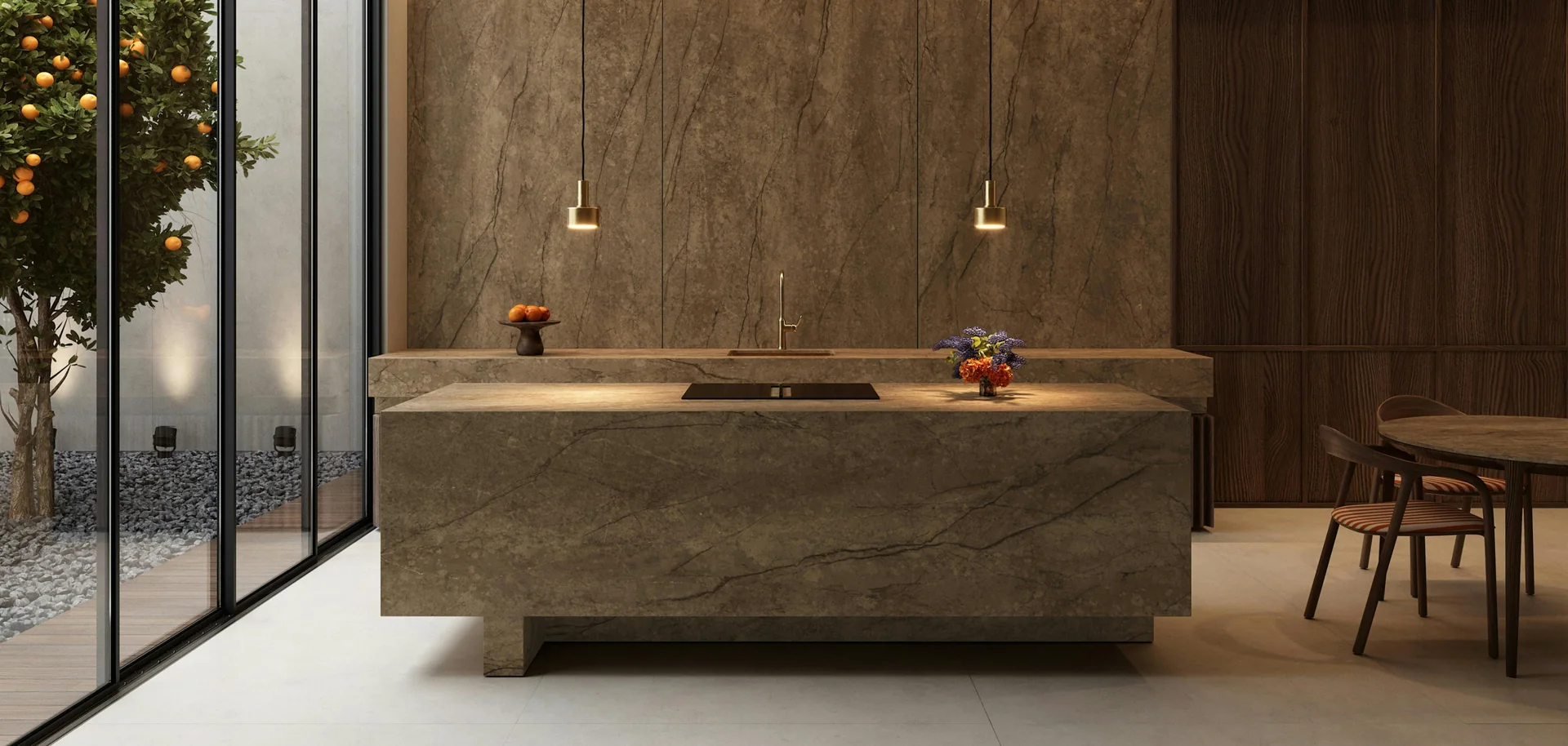 Warm stone kitchen with floor-to-ceiling glazing