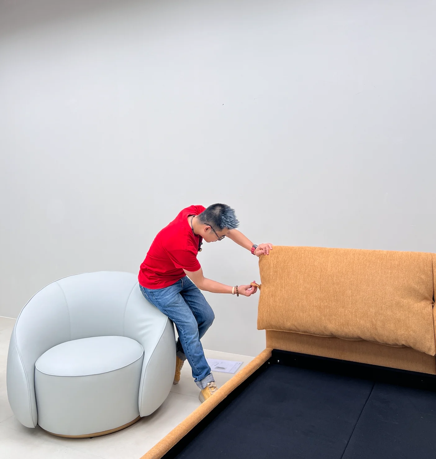 Checking the upholstery and internal construction of a sofa